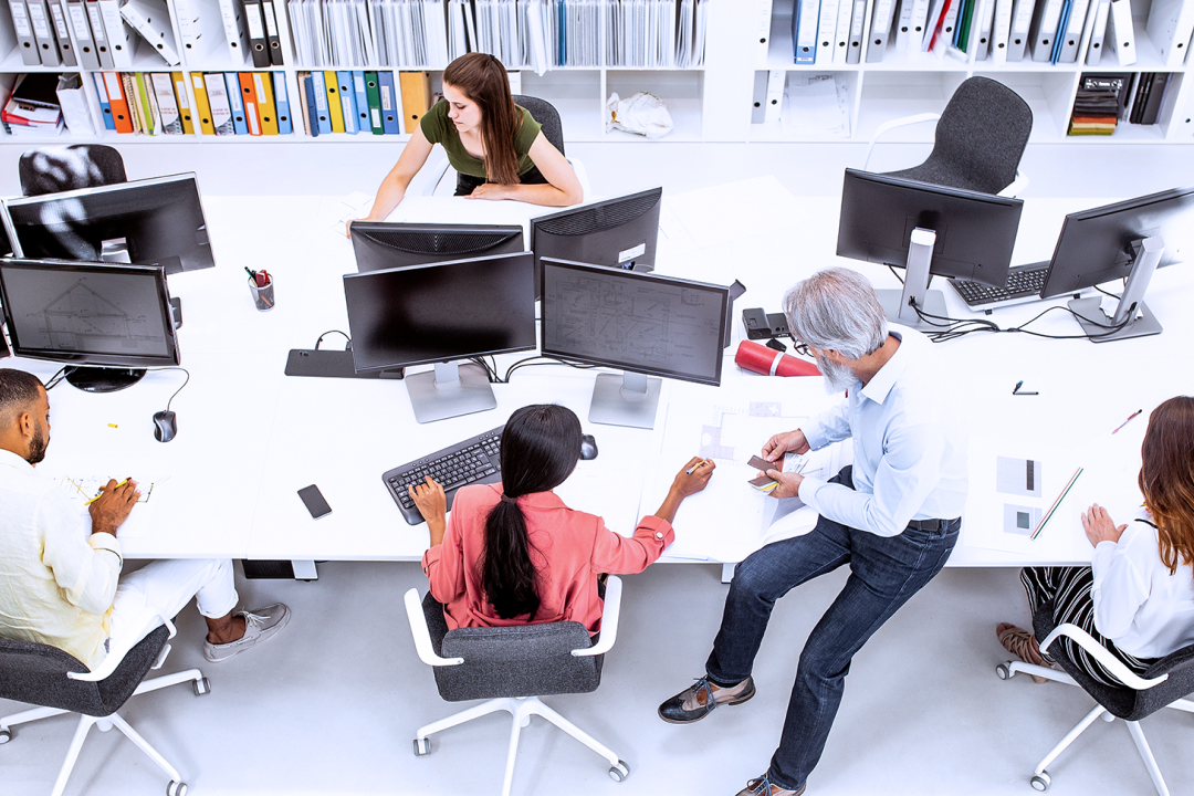 Employees working in an open office space